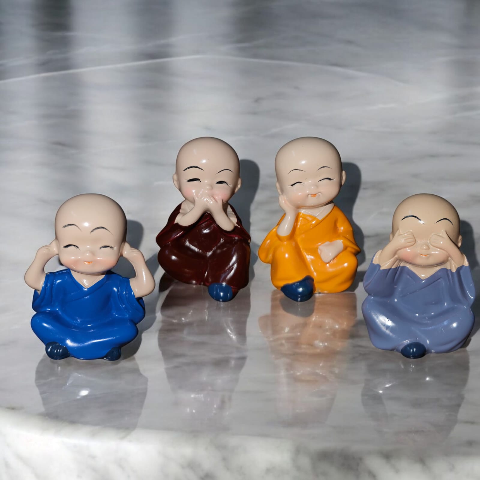 Noblenest Set of 4 Miniature Buddha Monk Figurines – Decorative Resin Statues, Multicolor