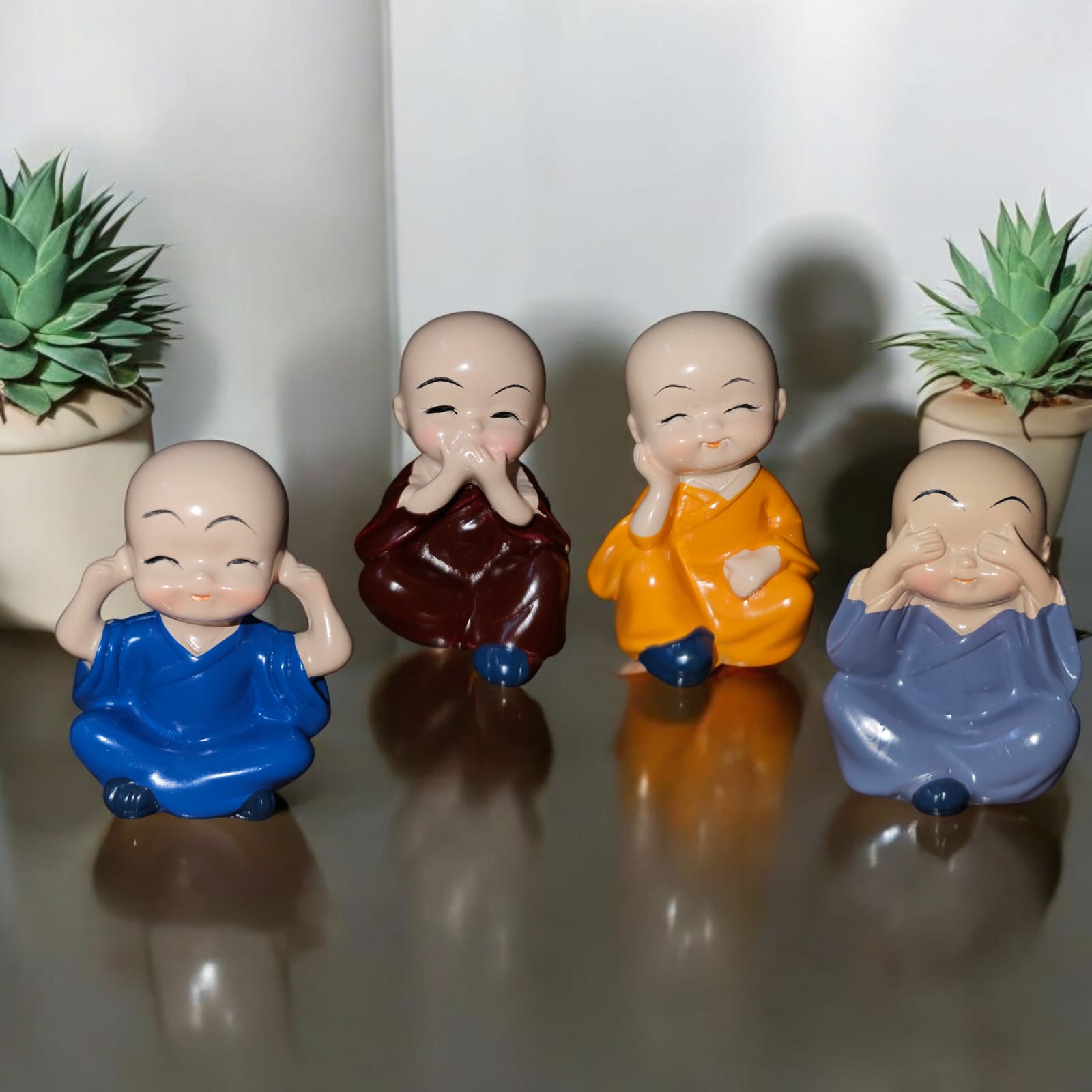 Noblenest Set of 4 Miniature Buddha Monk Figurines – Decorative Resin Statues, Multicolor