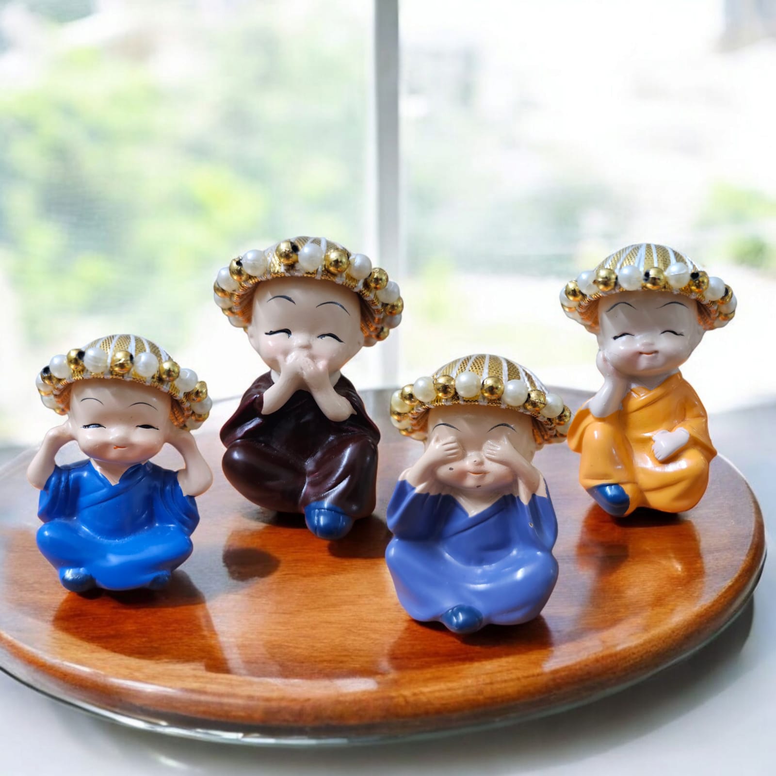 Noblenest Set of 4 Miniature Buddha Monk Figurines with Cap – Decorative Resin Statues, Multicolor