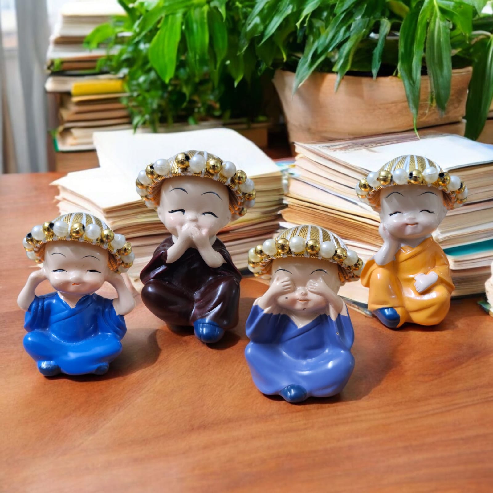 Noblenest Set of 4 Miniature Buddha Monk Figurines with Cap – Decorative Resin Statues, Multicolor